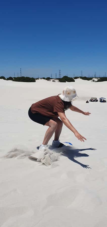 Cape Town: Atlantis Sand Dunes Sandboarding Experience - The ride down, with Table Mountain in view