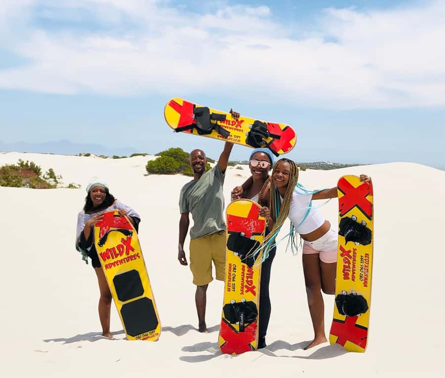 Cape Town: Atlantis White Sand Dunes Sandboarding Adventure - Riding the white dunes at Atlantis
