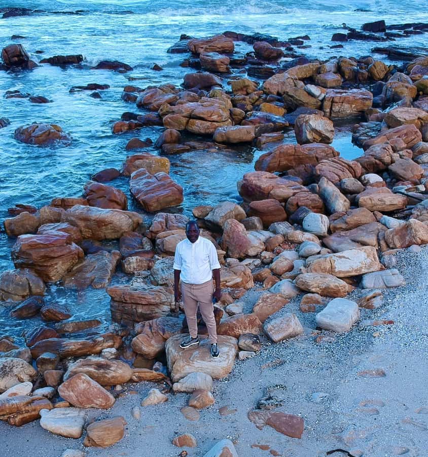 Cape Town: Cape of Good Hope & Penguins Full-Day Guided Tour - Camps Bay and Maiden’s Cove: an easy opening view