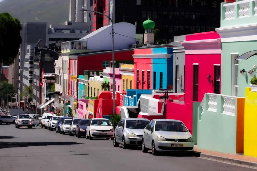 Cape Town: Cape Peninsula & Boulders Beach Shared Tour - Camps Bay and Maidens Cove frame the Twelve Apostles