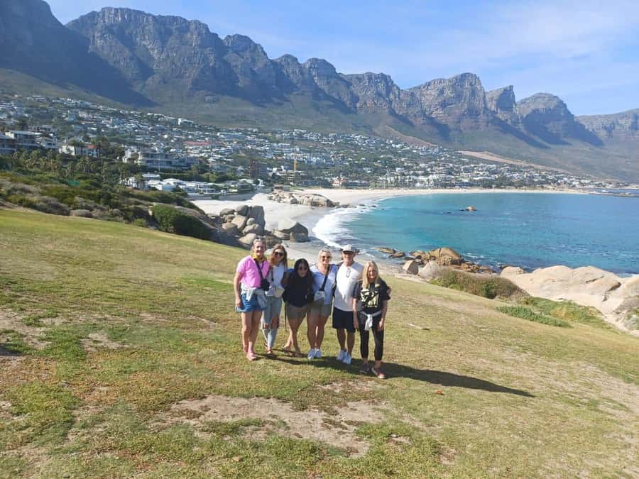 Cape Town Table Mountain Penguins & Cape Point All-inclusive - Maiden’s Cove frames the Twelve Apostles