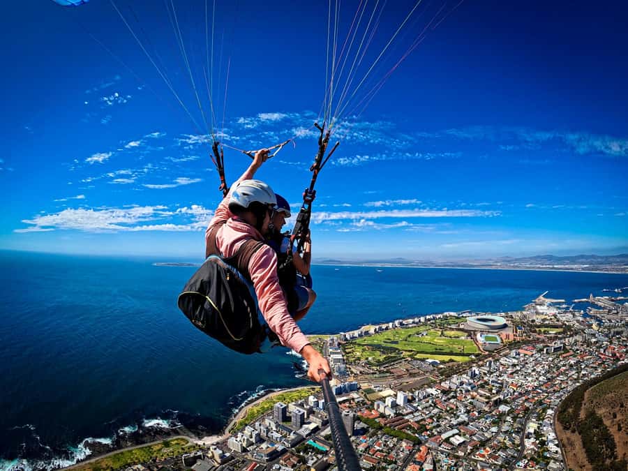 Cape Town: Tandem Paragliding with views of Table Mountain - Lions Head route toward Camps Bay