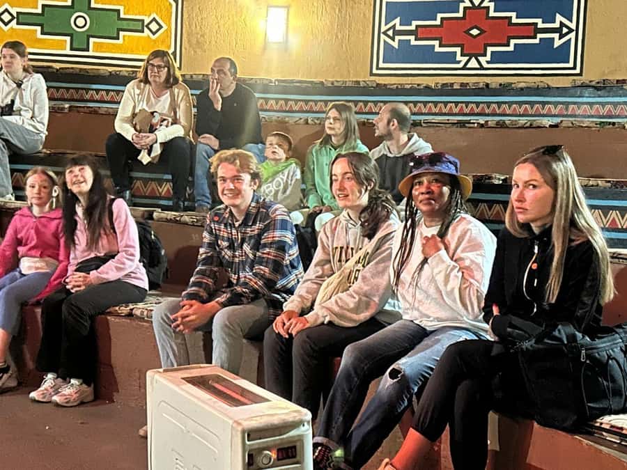 Cradle of Humankind and Lesedi Cultural Village - Guide languages and the Portuguese warning