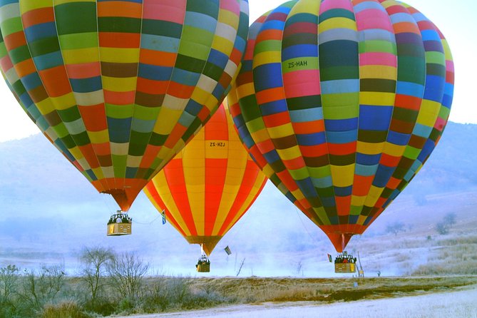 Early Morning Balloon Safari with Breakfast from Magaliesburg - Landing, drinks, and the breakfast reward