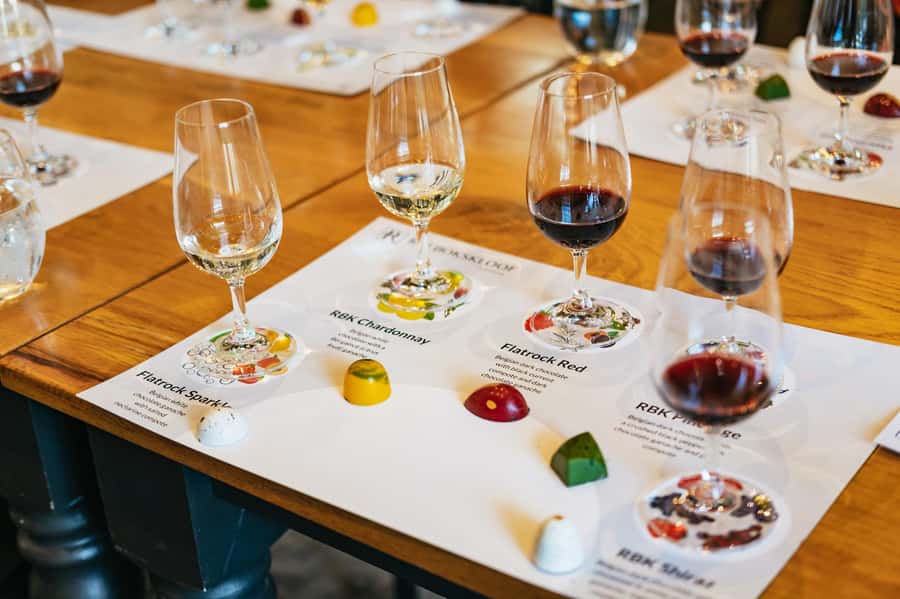 From Cape Town: 3 Regions Wine Tour with 3 Estates, 15 Wines - Franschhoek lunch and a short town visit