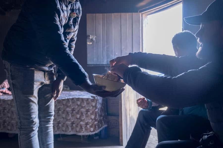 From Durban: Sani Pass, Lesotho and Basotho Village Day Trip - Inside a traditional Basotho mountain home