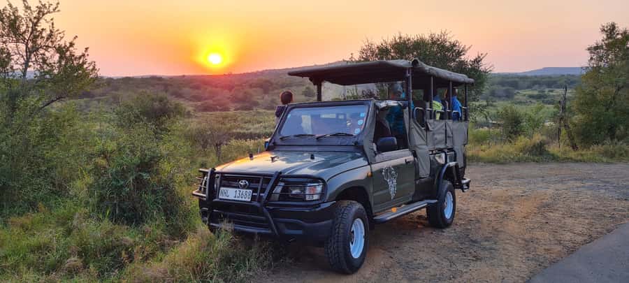 From St Lucia: Big 5 Safari in the Hluhluwe-Imfolozi Park - Eight hours among rhino, birds, and Zululand scenery
