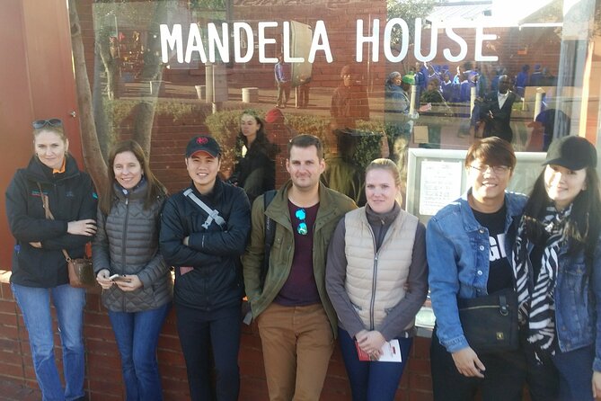 Half Guided Day Tour of Soweto And Apartheid Museum - What the guide adds