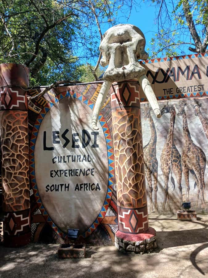 Johannesburg: Lesedi Cultural Village Show with Pickup - Drums and painted walls at the Ndebele amphitheatre