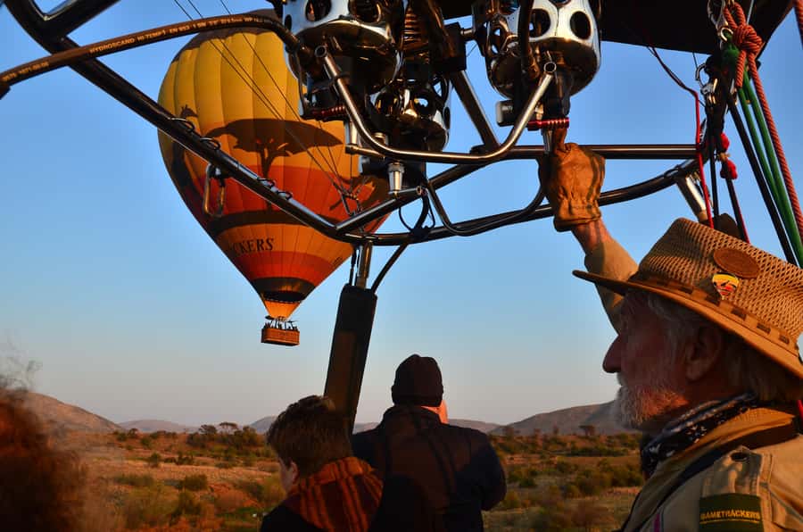 Pilanesberg National Park/Sun City Hot Air Balloon Safari - Sunrise over Pilanesberg, with the park below