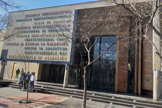 Soweto and Johannesburg Exclusive Full Day Guided Tour - Hector Pieterson Museum explains the Soweto Uprising